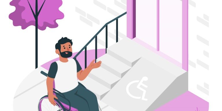 hombre en silal de redas afuera de un local con rampa