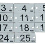 Etiquetas Braille con números para identificar la ropa Discapacidad visual
